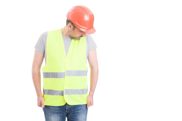 Jeune constructeur portant un casque rigide et gilet jaune réfléchissant — Photo