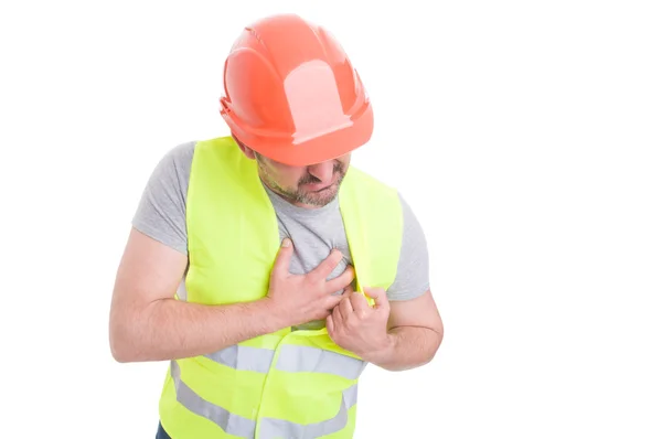 Cardiac disease concept with builder with chest pain — Stock Photo, Image