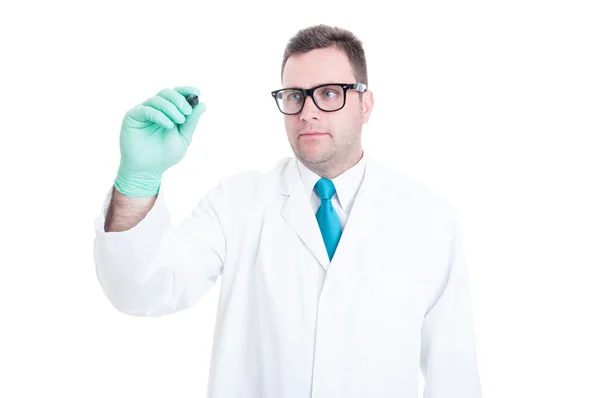 Male doctor writing on transparent screen copyspace — Stock Photo, Image