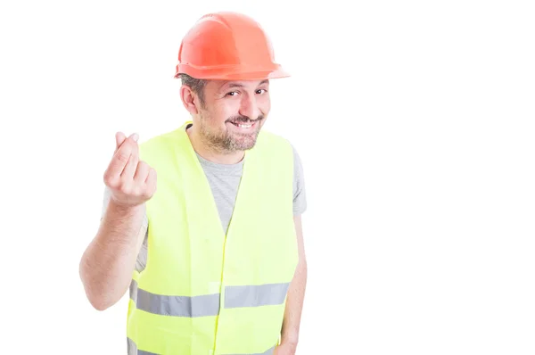 Alegre constructor sonriendo y haciendo gesto de dinero — Foto de Stock