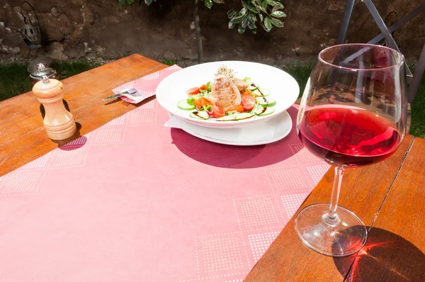 Lunch and wine outside on terrace table — Stock Photo, Image