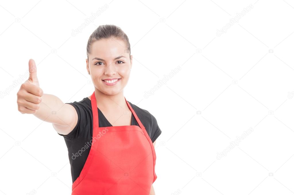 Portrait of beautiful store employee showing like sign
