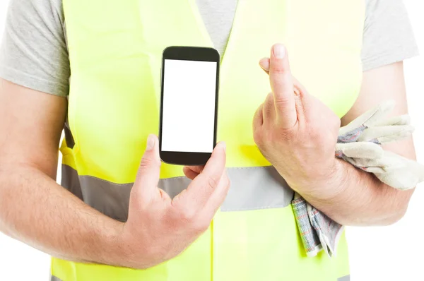 Engineer holding cellphone and fingers crossed in closeup — Stock Photo, Image