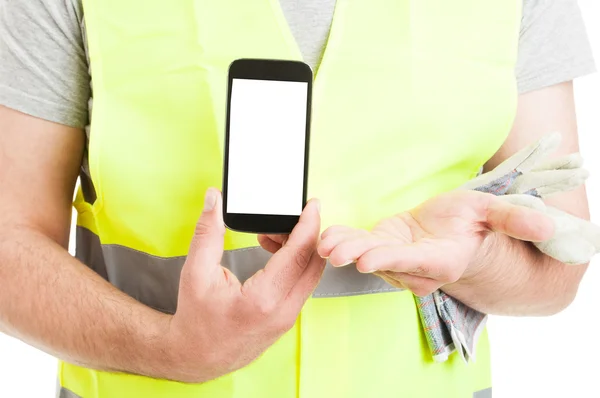 Close-up constructor presenting cellphone with empty display — Stock Photo, Image