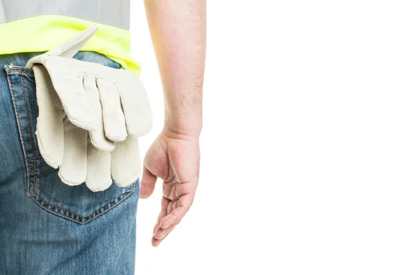 Close-up van bouwvakker met vest en handschoenen — Stockfoto