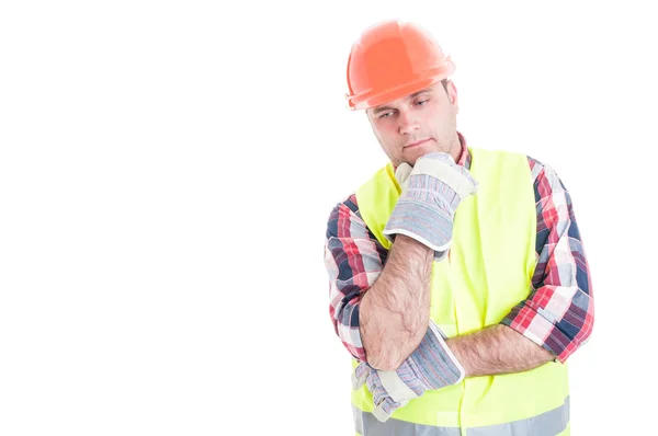 Thoughtful builder reflecting at something — Stock Photo, Image