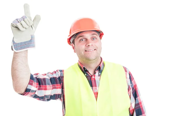 Zufriedener Bauunternehmer zeigt mit dem Finger nach oben — Stockfoto