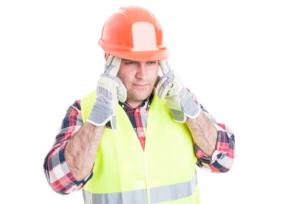 Constructor masculino estresado que sufre de dolor de cabeza — Foto de Stock