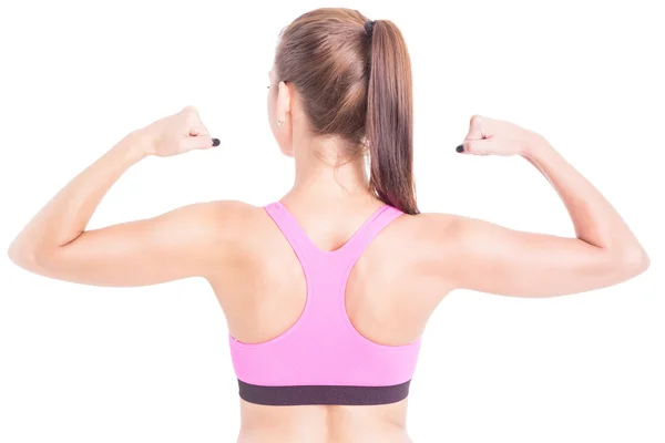 Donna in forma mostrando i muscoli della schiena e dei bicipiti — Foto Stock