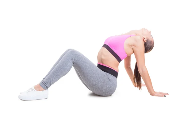 Ajuste chica doblando sobre la espalda estiramiento para el entrenamiento —  Fotos de Stock