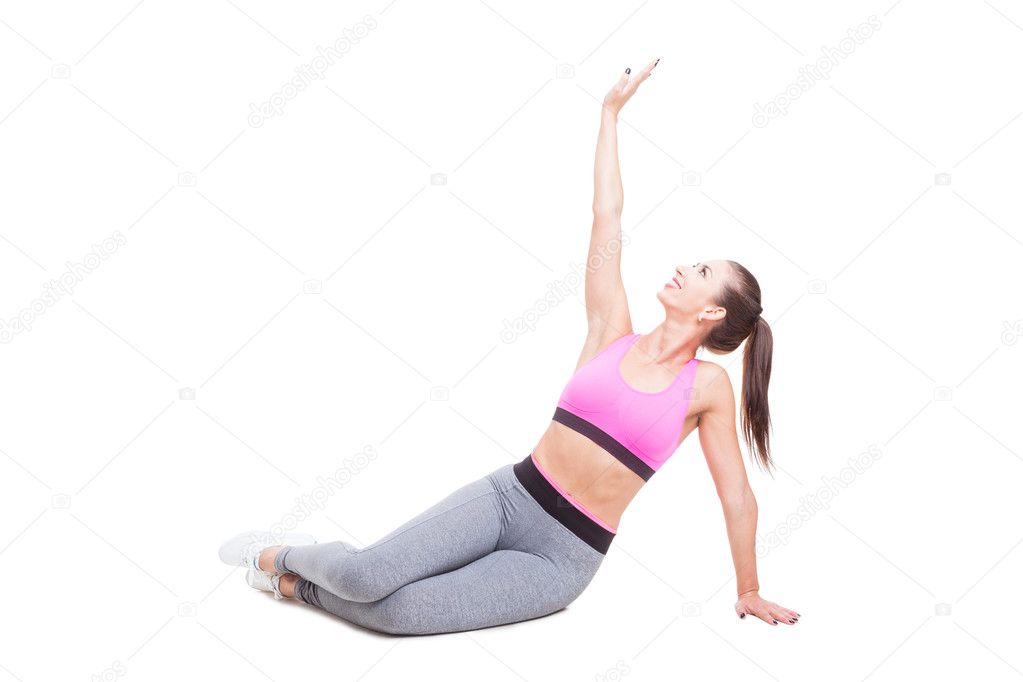 Female trainer preparing and stretching for workout