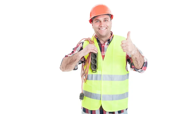 Fröhlicher Bauarbeiter mit Stromkabel — Stockfoto