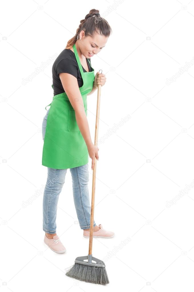 Hypermarket employee sweeping the store