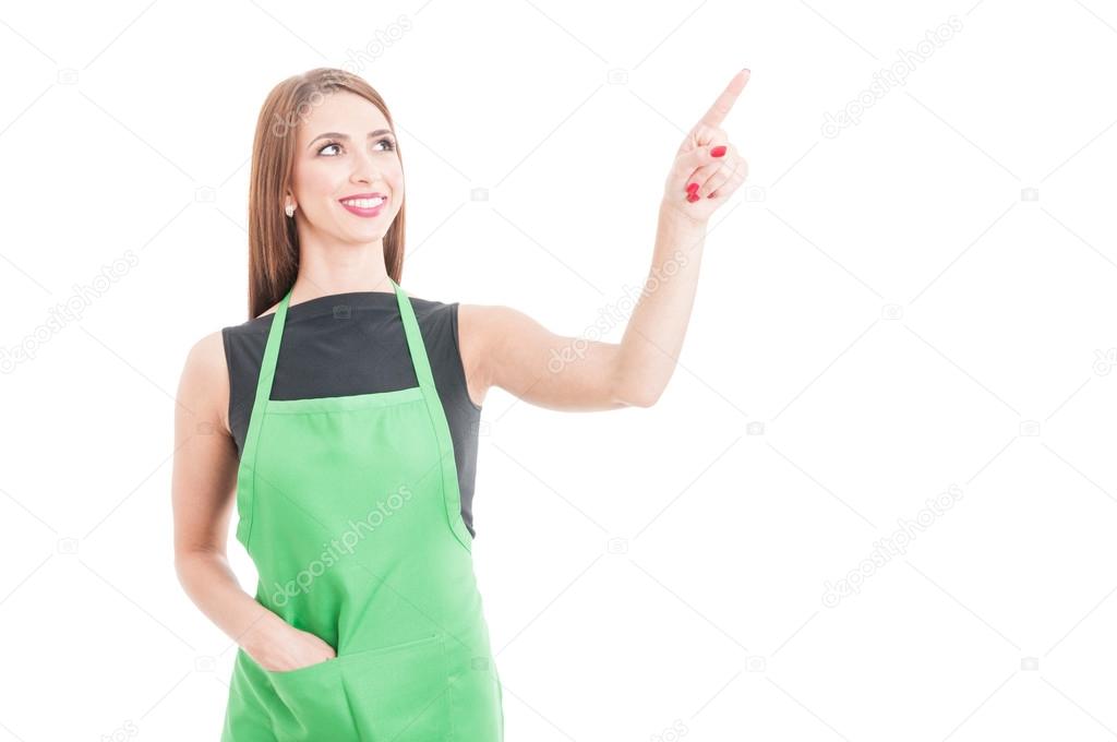 Beauriful female seller pointing at the screen 