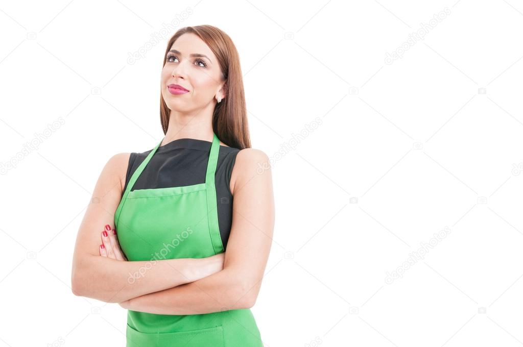 Beautiful confident employee standing with crossed arms