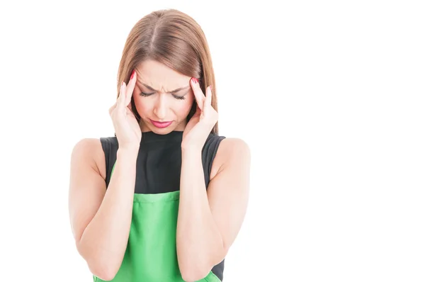 Supermarket seller with head pain — Stock Photo, Image