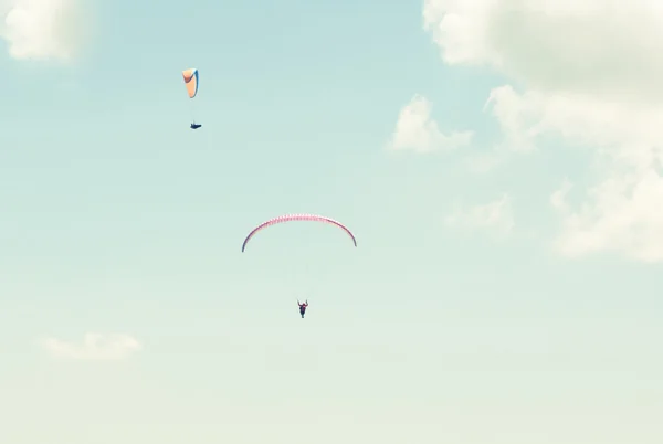 Two paraglider in the sky in sun light — Stock Photo, Image