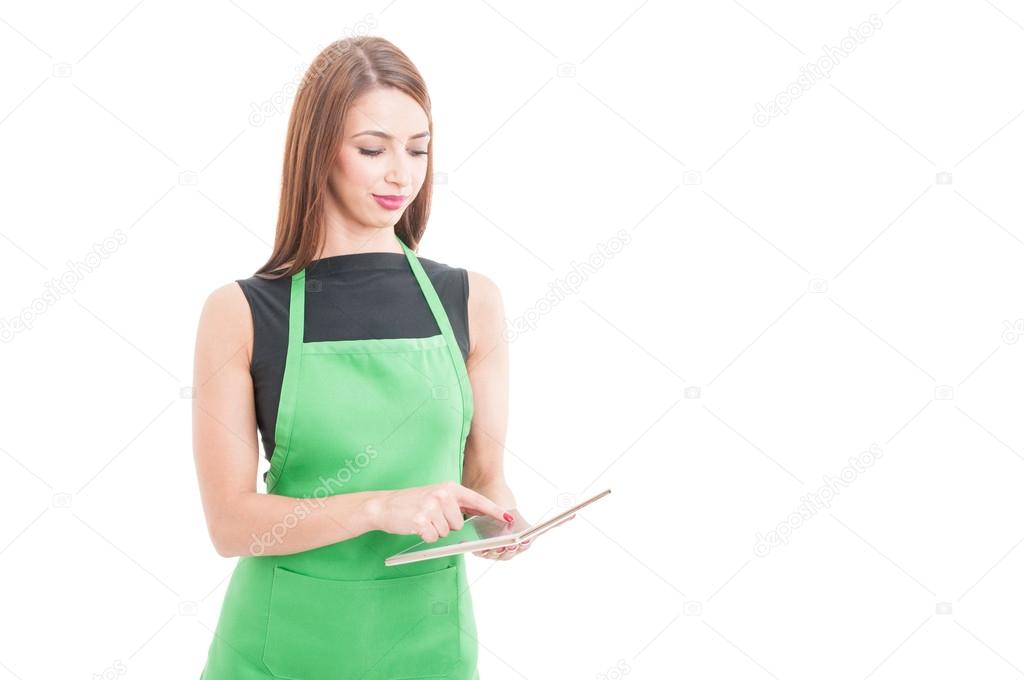 Hypermarket clerk working on modern tablet