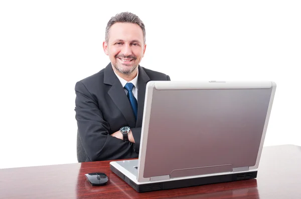 Guapo director ejecutivo en su escritorio — Foto de Stock