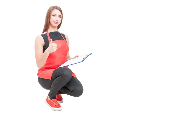 Friendly storekeeper showing thumb up — Stock Photo, Image