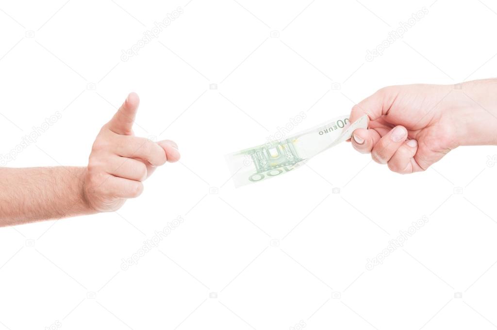 Closeup of man refusing money from another person