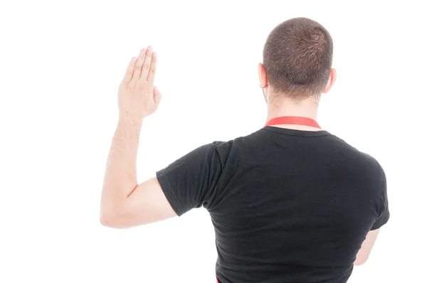 Back view of supermarket seller making a vow — Stock Photo, Image