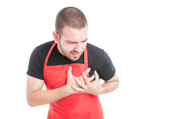 Pracownik supermarketu o ból w klatce piersiowej — Zdjęcie stockowe