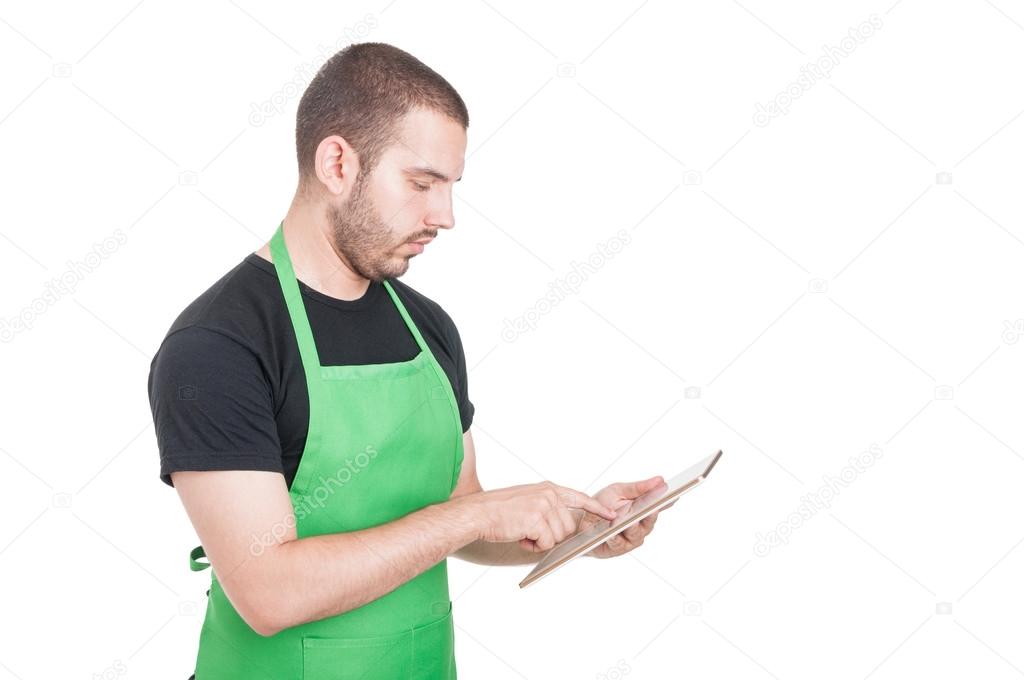 Successful salesperson reading something on tablet