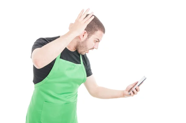 Male employee yelling at phone being angry — Stock Photo, Image