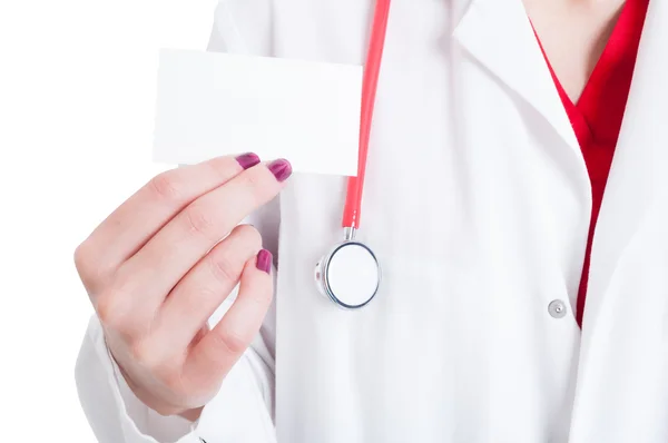 Closeup of visit card in female medic hand — Stock Photo, Image