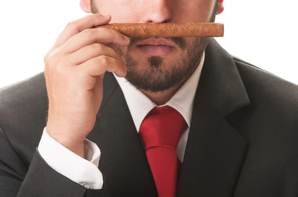 Człowiek biznesu zapach oryginalne kubańskie cygaro — Zdjęcie stockowe