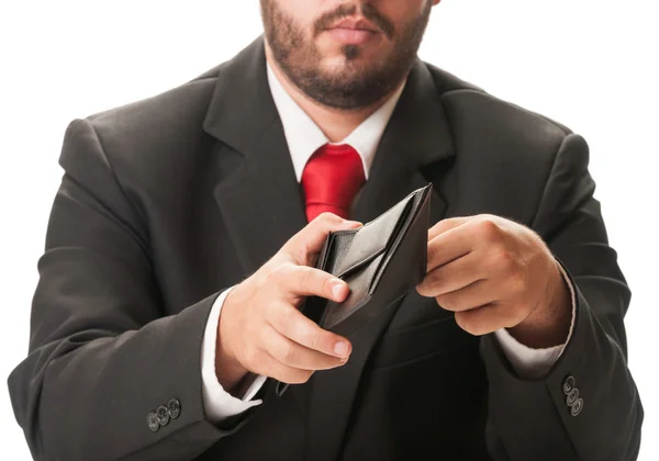 Business man looking into his wallet — Stock Photo, Image