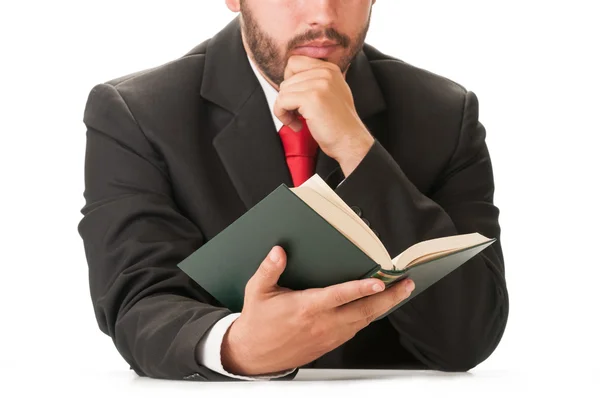 Hombre de negocios sosteniendo un libro — Foto de Stock