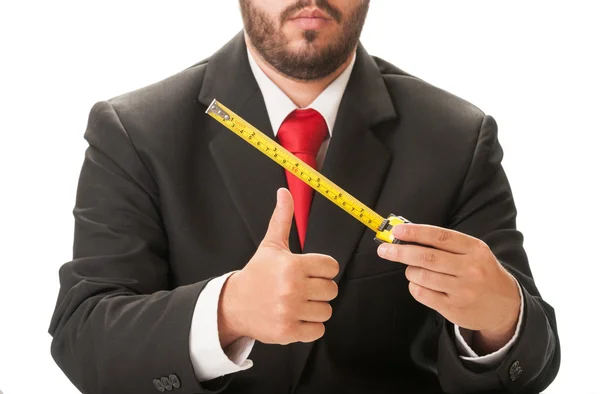 Hombre de negocios sosteniendo una regla y mostrando OK — Foto de Stock