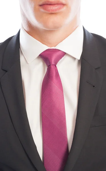 Closeup of black suit and pink necktie — Stock Photo, Image