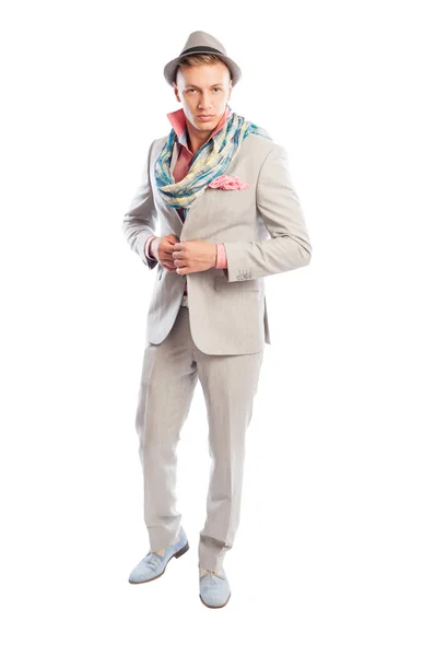 Fashionable male model wearing grey suit, scarf and hat — Stock Photo, Image