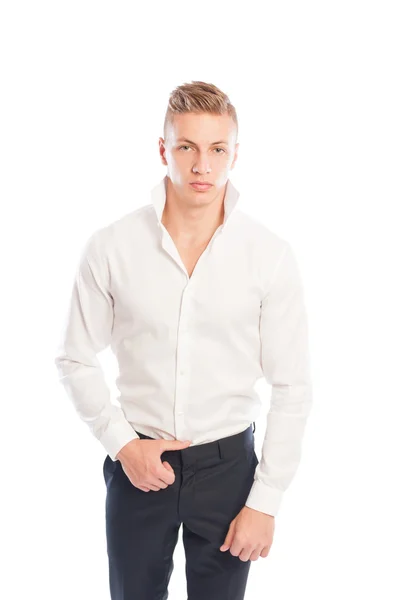 Blond male model wearing white shirt and back pants — Stock Photo, Image