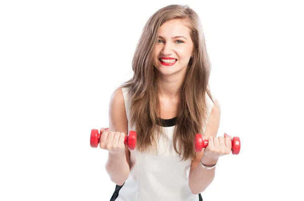 Female model lifting small red weights — Stock Photo, Image