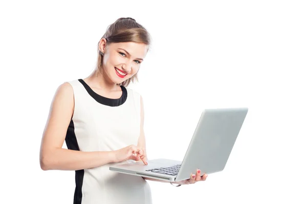 Smiling business woman working on laptop — Stock Photo, Image