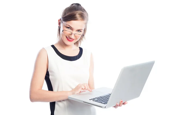 Business woman with glasses holding laptop — Stock Photo, Image