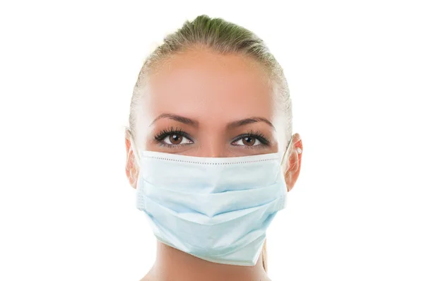 Face of a doctor woman wearing hospital mask — Stock Photo, Image