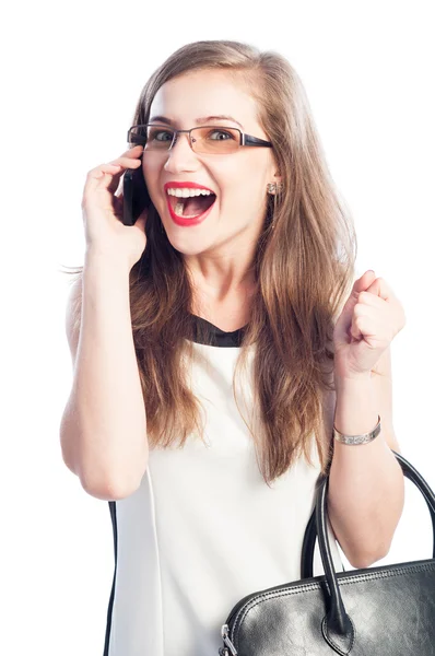 Excited business woman talking on smartphone — Stock Photo, Image