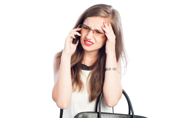 Stressed and tired business woman talking on the phone — Stock Photo, Image