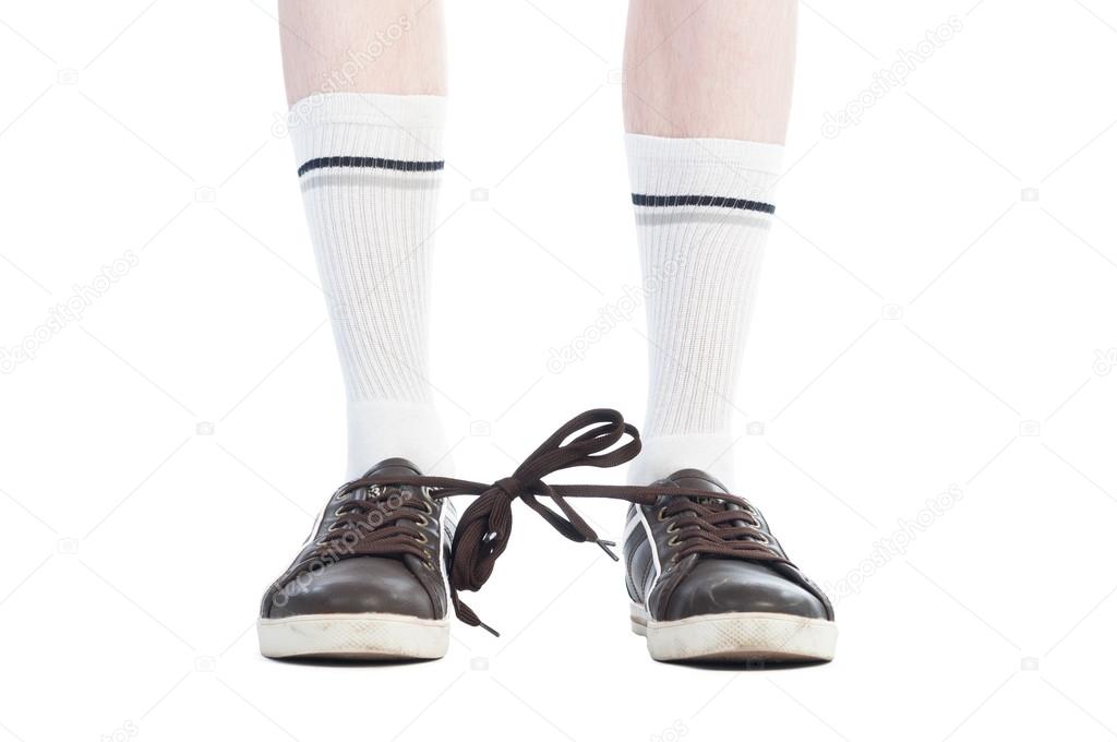 Long socks and shoe laces tied together prank Stock Photo by ...