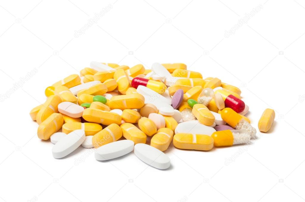 Pills on white background