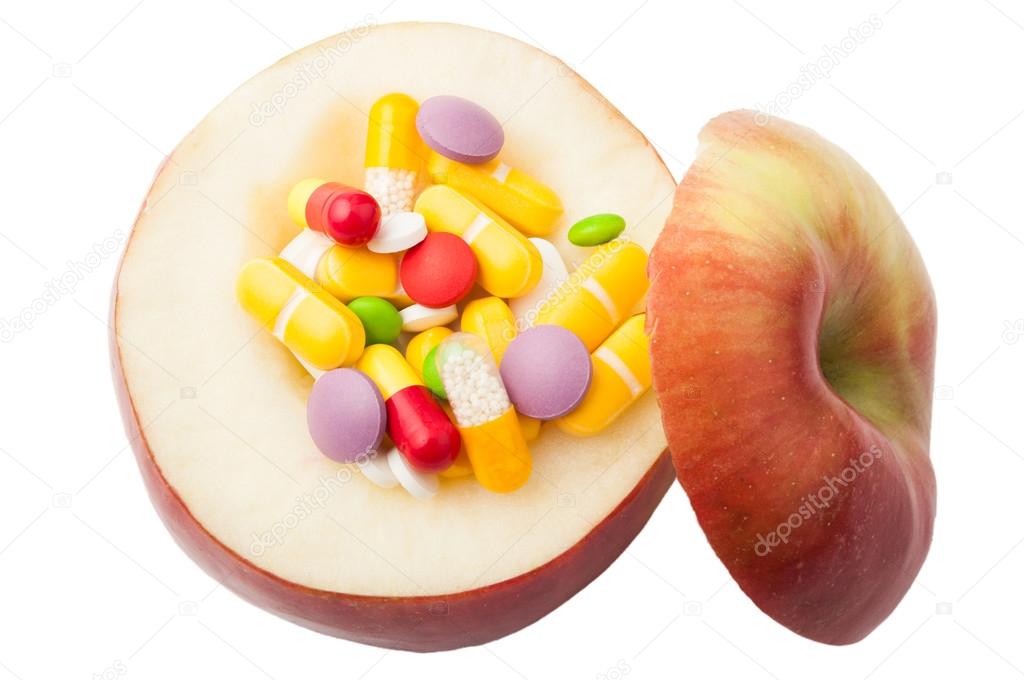 Apple filled with drugs concept