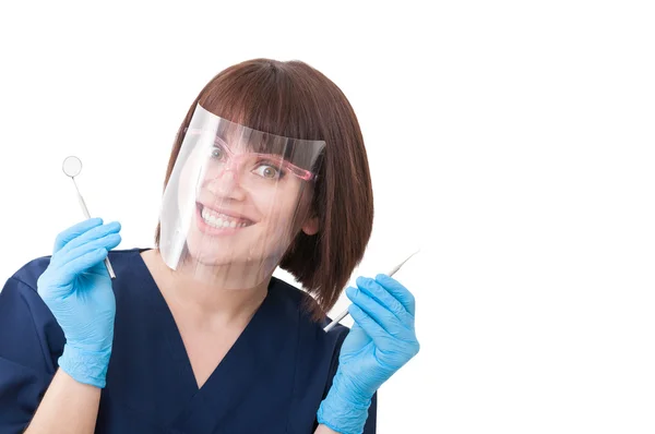 Crazy tandläkare kvinna med verktyg i handen — Stockfoto