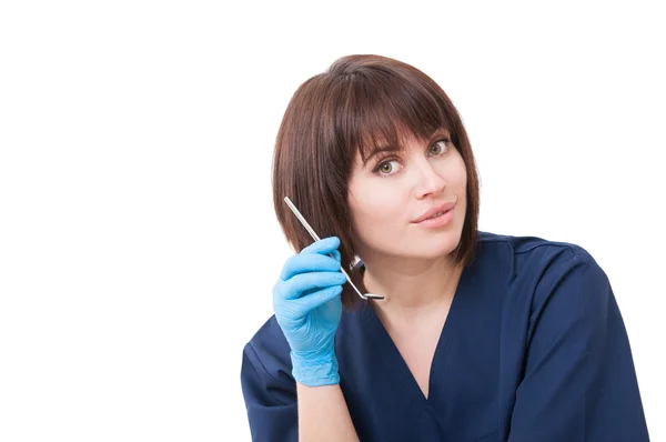 Bella donna dentista che simula una telefonata — Foto Stock