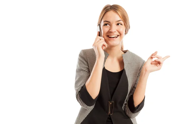 Aufgeregte Verkäuferin spricht auf dem Smartphone — Stockfoto