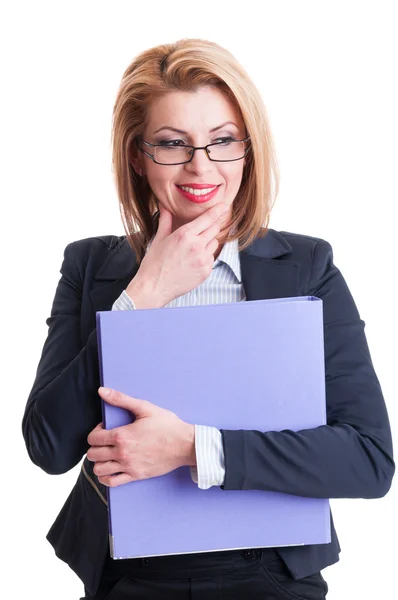 Business woman smiling and thinking — Stock Photo, Image